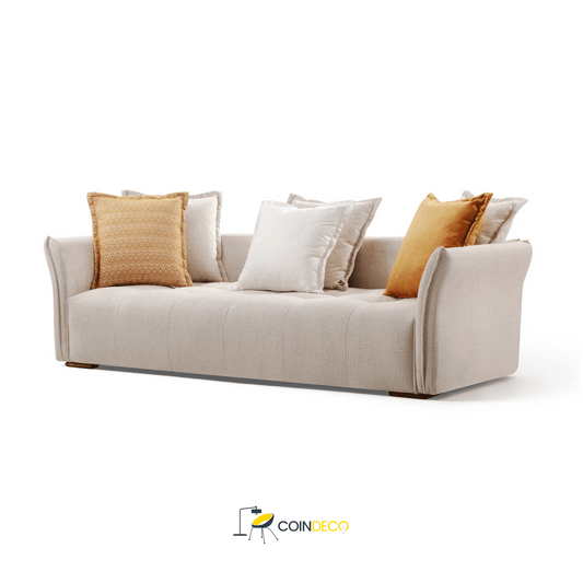 كنبة فاخرة بلون أبيض ناصع – تصميم عصري بوسائد ملونة أنيقة